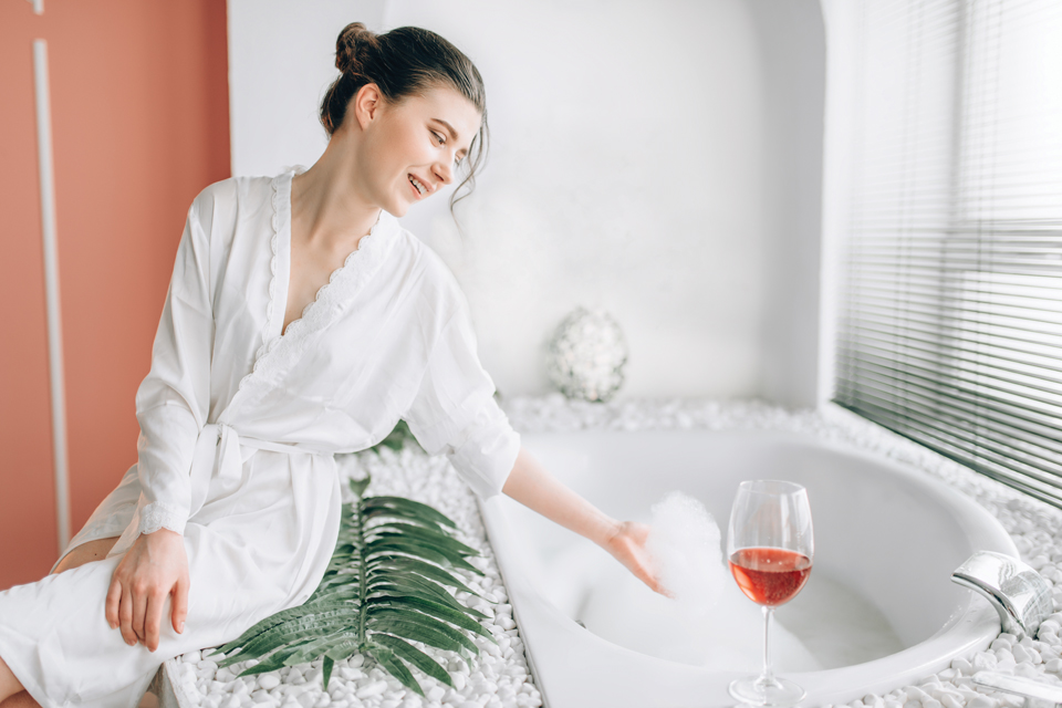 Woman relaxing in bathroom